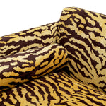 Eichholtz Sofa Flux brown. This piece blends sumptuous fabrics with an arresting animal-inspired design, crafting a unique allure