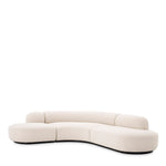 Eichholtz Sofa Björn L Enjoy the rich comfort and the striking boomerang-like design of Sofa Björn. Organic in shape