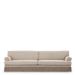 Eichholtz Sofa Madison supported by a black base, it's a fusion of classic and contemporary design. The Sofa