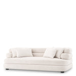Eichholtz Sofa Malaga S The Malaga S lyssa off-white sofa with black feet is brimming with flair. This sofa