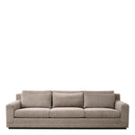 Eichholtz Sofa Manhattan in Hunt Chenille Taupe with a sleek black base, it complements any decor effortlessly. It