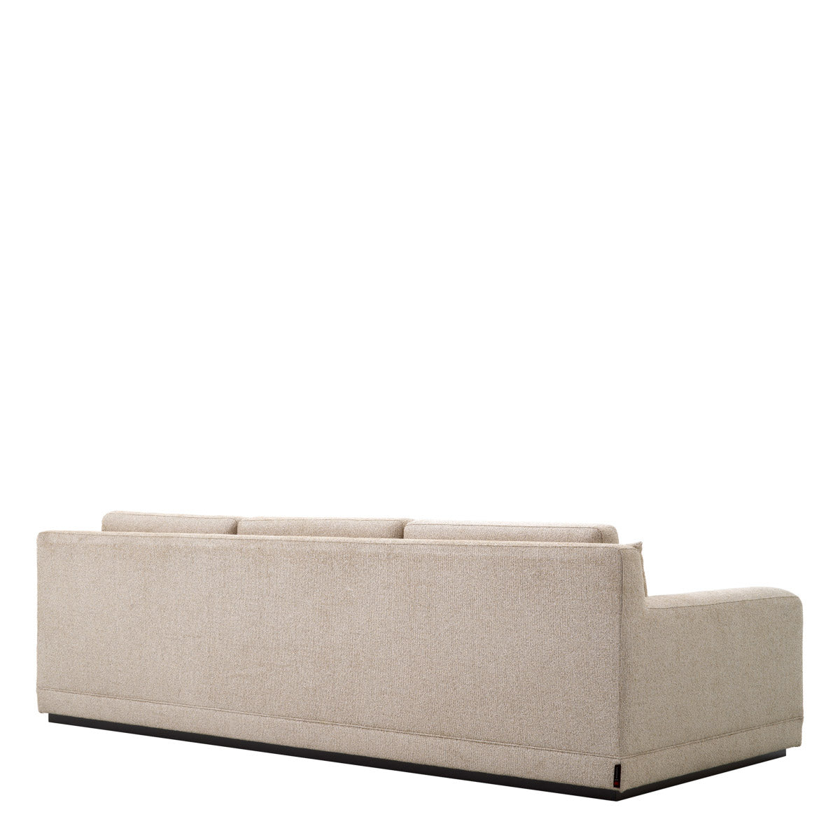Eichholtz Sofa Manhattan Upholstered in sumptuous Palmer BeigeÂ fabric with a sleek black base, it harmonizes beautifully with