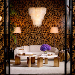 Eichholtz Sofa Marbella features Creststone beige fabric and a sophisticated black base. Crafted with timeless design and artisan