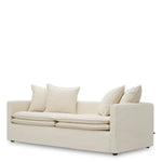 Eichholtz Sofa Montgomery Introducing the Eichholtz Sofa Montgomery in Sunbeam Off-White, a testament to both style and durability.