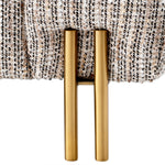 Eichholtz Sofa York and brushed brass legs oozes a touch of decadence. Its distinctive silhouette is inspired by