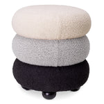 Eichholtz Stool Tulum by its unique marshmallow-like curves in a trio of cream, grey and black bouclÃ© fabric.