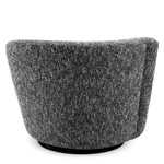 Eichholtz Swivel Chair Colin left Colin left Crafted by Eichholtz this armchair pairs refined design with elevated materials for a