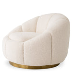 Eichholtz Swivel Chair Inger elevated materials for a statement in any luxury interior. Dimensions W 37.5" D 32.5" H