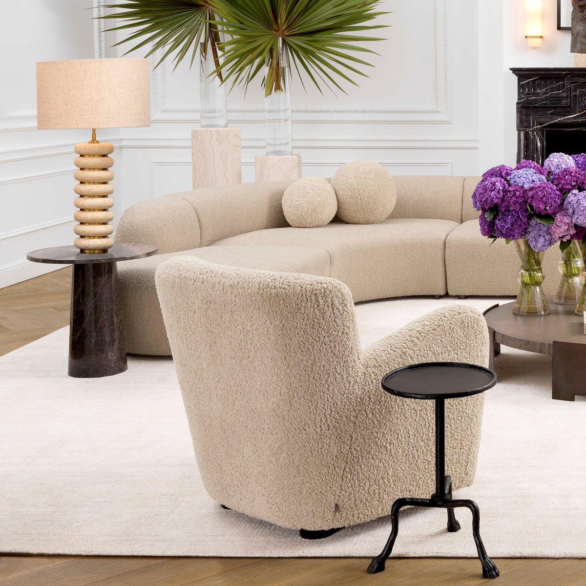 Eichholtz Table Lamp Baron sculptural travertine base, antique brass finish and linen mix shade, the table lamp is ideal