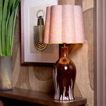 Eichholtz Table Lamp Beatriz by a vintage brass accent. This unique piece boasts a specially crafted linen mix shade,