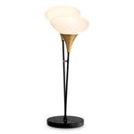 Eichholtz Table Lamp Duco shines a light in your space. Sitting on a black marble base and provided with