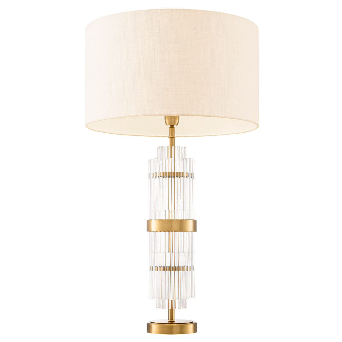 Eichholtz Table Lamp East included shade complements the overall design. Perfect for adding a warm and inviting glow to