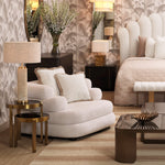 Eichholtz Table Lamp Lxry care, this lamp features a body made of travertine, showcasing the stone's unique natural variations