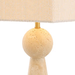 Eichholtz Table Lamp Novak texture of the travertine base. Blend classic and modern design elements with the Novak Table
