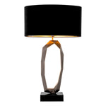 Eichholtz Table Lamp Santos lamp's black marble base provides a sturdy and grand foundation. Adding to the allure of