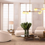 Eichholtz Table Lamp Stilla finish radiates a captivating warmth, while the drop-shaped crystal glass adds an element of glamour