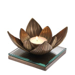 Eichholtz Tealight Holder Lotus 0 Tealight Holder Lotus Crafted by Eichholtz this candle holder pairs refined design with elevated