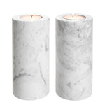 Eichholtz Tealight Holder Tobor L set of 2 The simple design of the 2-piece set of cylindrical Tobor L Tealight Holders adds refinement