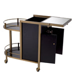 Eichholtz Trolley Bellini display and storage. The cupboard is accessible from the frontside with doors. Castor wheels make