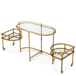 Eichholtz Trolley Lavalle enhanced by a clear glass layer. This exquisite piece, featuring a unique expandable design and