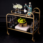 Eichholtz Trolley Montreuil remarkably elegant frame with a brushed brass finish, this luxury bar cart has a removable