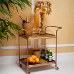 Eichholtz Trolley Pescara rattan tiers. This chic bar cart comes ready with four bar accessories, blending form and