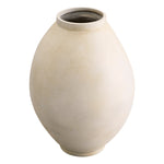 Eichholtz Vase Moon Jar to tradition, it's crafted by seamlessly joining two hemispherical halves. The subtle peach glaze, a