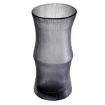 Eichholtz Vase Thiara grey glass vase is adorned with engraved lines and characterised by a bamboo-like kink.Â Vase
