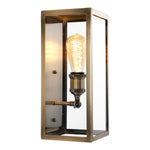 Eichholtz Wall Lamp Irving enticing one-light sconce showcases a simple rectangular frame with an antique brass finish and clear