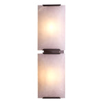 Eichholtz Wall Lamp Ortiz a timeless allure. The alabaster shades harmonize with the bronze to cast a warm, inviting