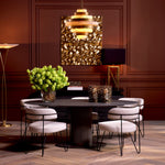 Eichholtz Wall Object Nulci artistry and luxury. The vibrant gold finish illuminates the piece's textured metal surface, inviting a